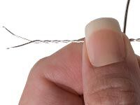 Twisted wire held in a hand